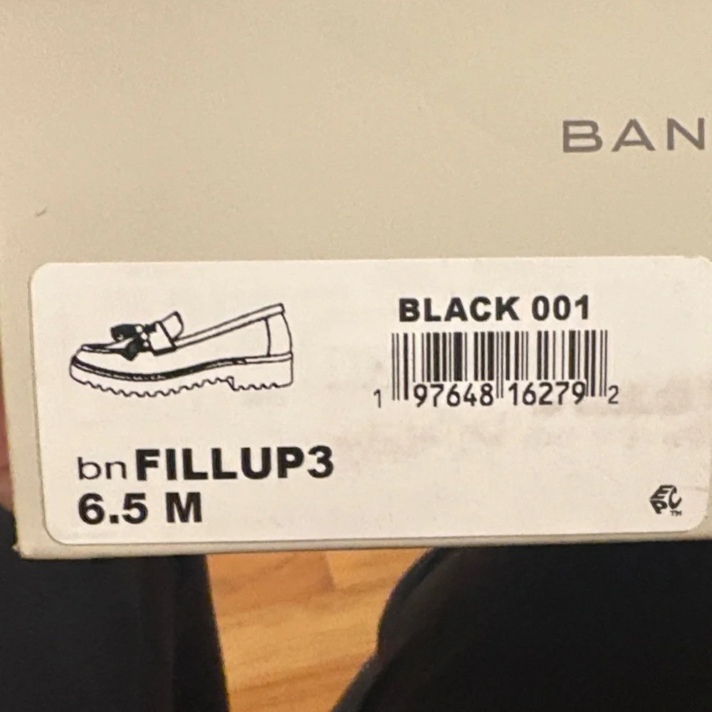 Bandolino Glossy Black Tassel Loafers